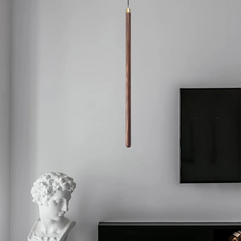 solid wood hanging lamp near tv