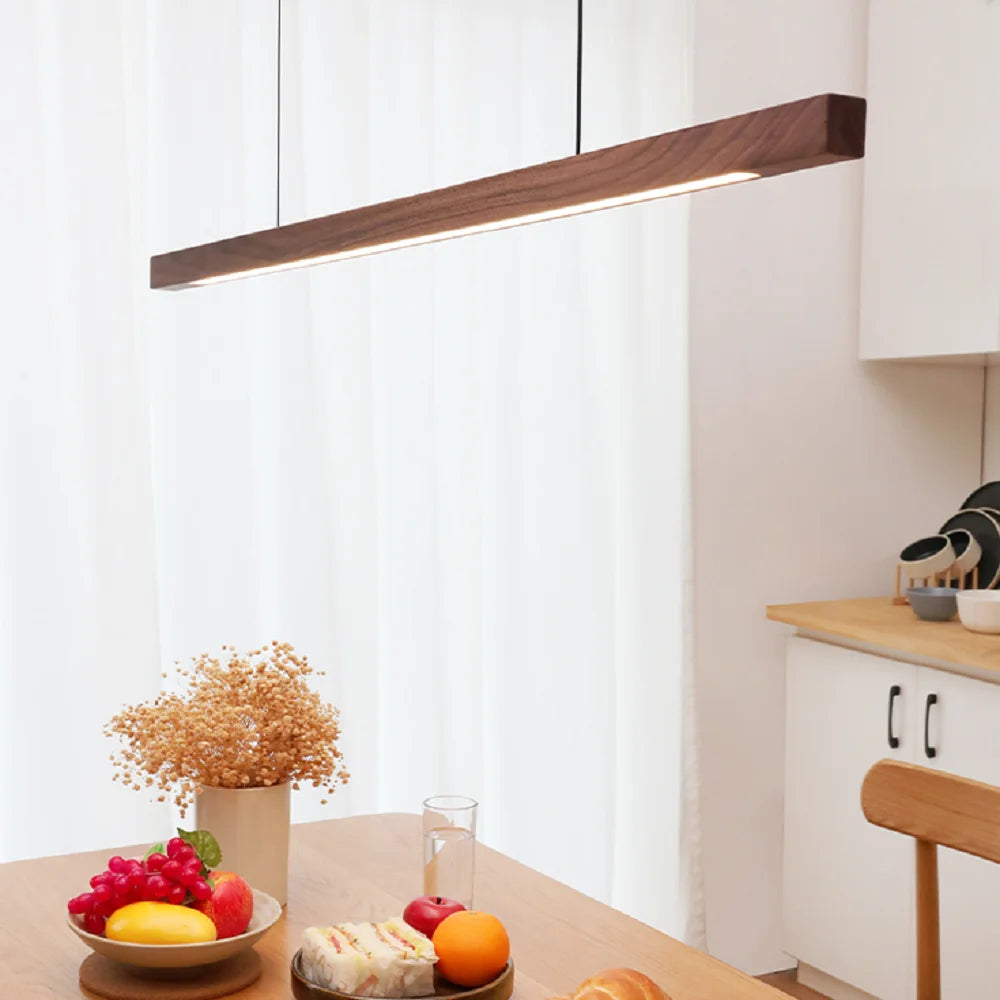 wood pendant light over kitchen table